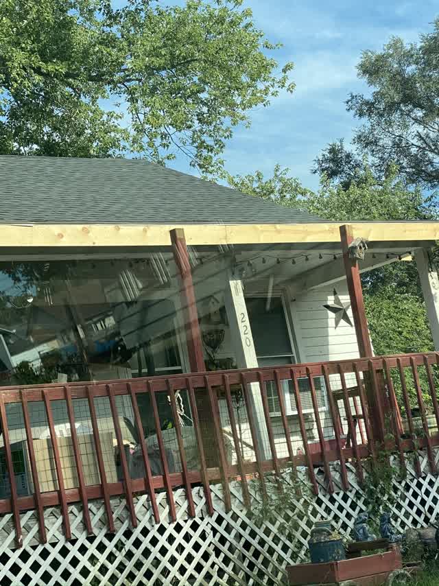 House with new fascia boards and shingle roof