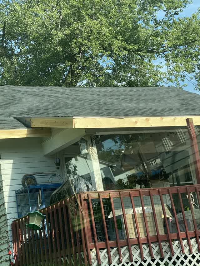 Shingle bundles staged on the roof during install