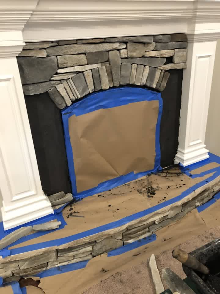 Close-up of the stone arch detail on the fireplace