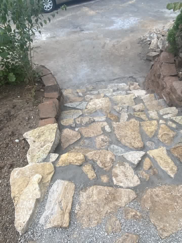 Flagstone steps up to the front porch