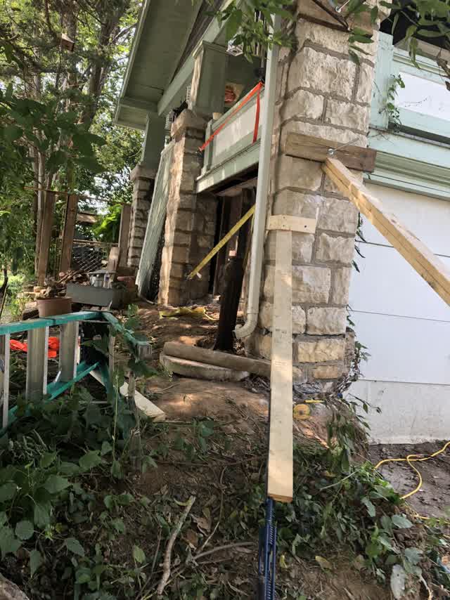Stone pillars braced during construction