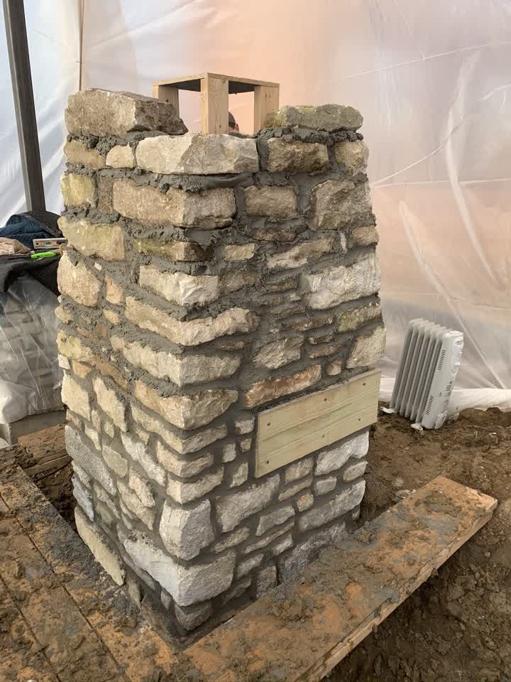 Close-up of a natural stone pillar under construction
