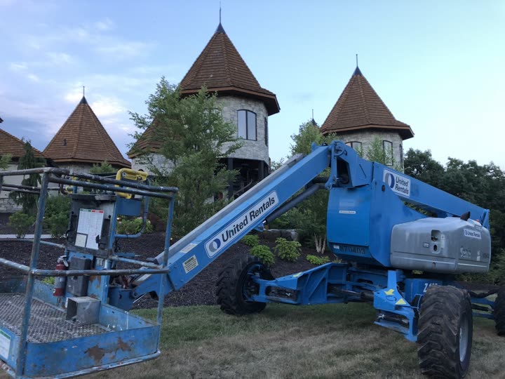 Shake roof installation with lift on site