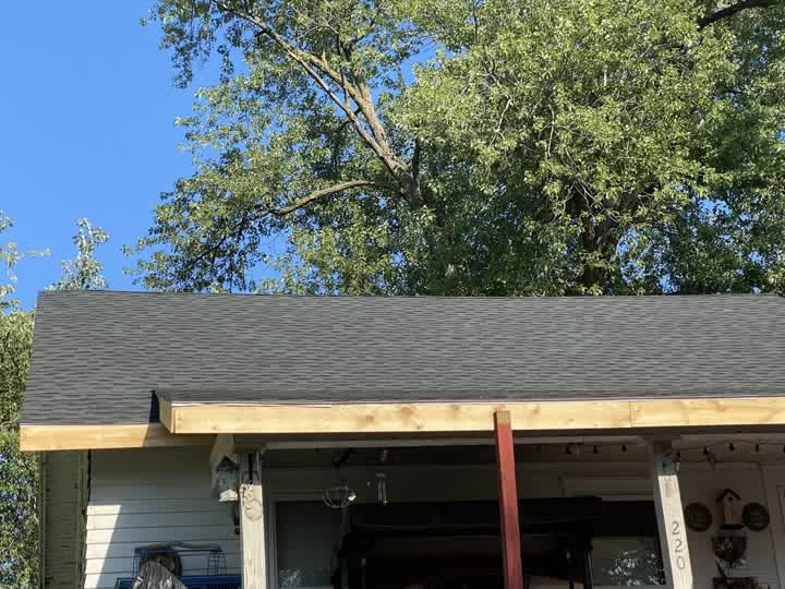 House with new shingle roof and new fascia boards
