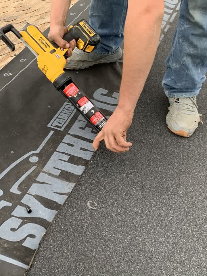 Chimney flashing and synthetic underlayment going in