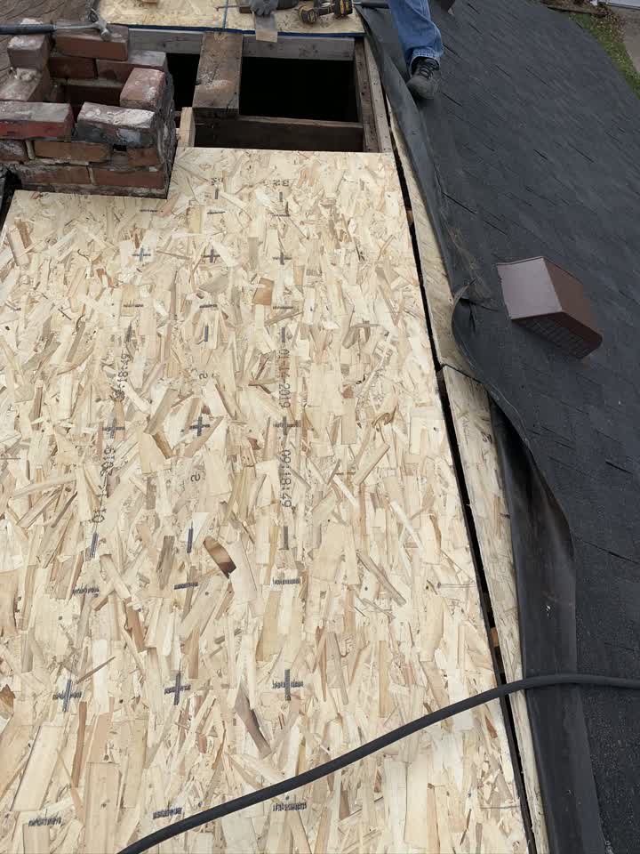 New roof decking beside the chimney