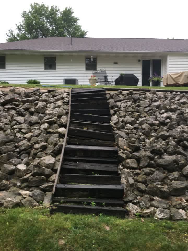 Old timber railroad-tie steps before replacement