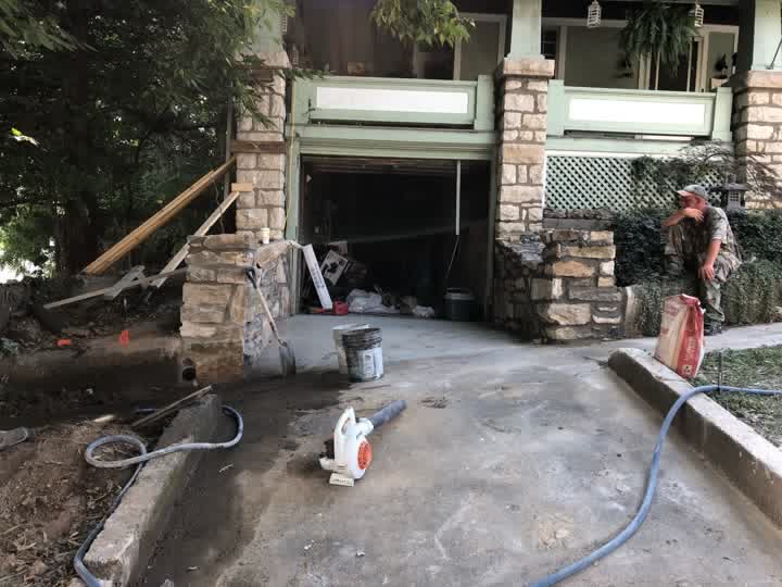 Stone retaining wall under construction